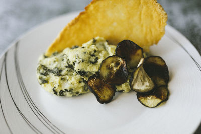 Plate of polenta with chard and parmiggiano