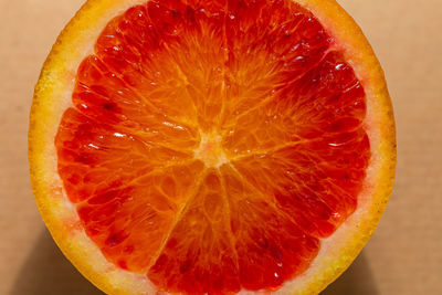 Detail of a fresh sliced orange, ideal for backgrounds or textures