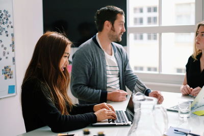 View of people in office meeting