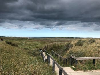 Scenic view of land against sky