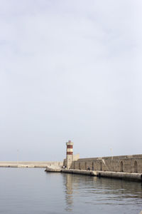 View of built structures against clear sky