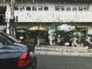 Wet glass window in rainy season