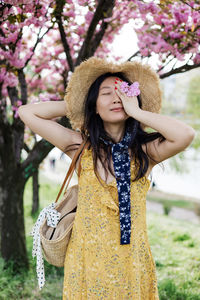 Young woman wearing hat