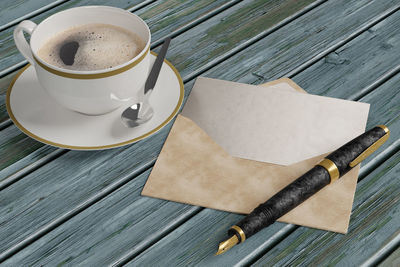 High angle view of coffee cup on table