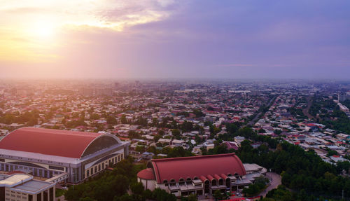 High angle view of townscape against sky during sunset