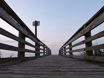 Low angle view of wooden walkway