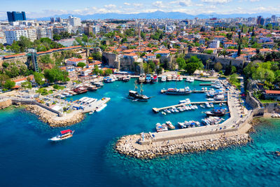 High angle view of city by sea