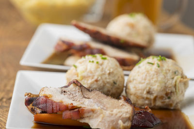 Close-up of served food on table