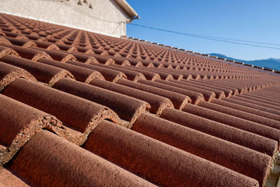 Low angle view of roof and building against sky