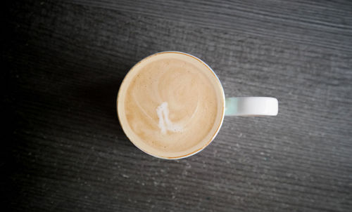 Close-up of cappuccino on table