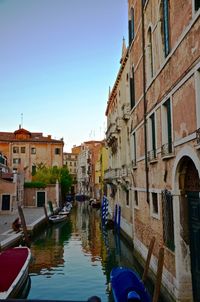 View of canal along buildings