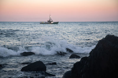 Scenic view of sea against sky during sunset