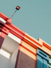 Low angle view of colorful building against clear sky