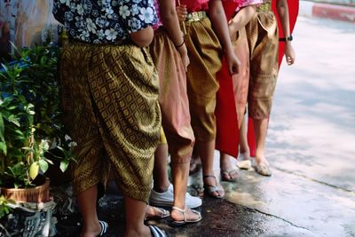 Low section of women standing outdoors