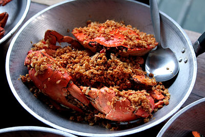 High angle view of mud crab  in cooking pan