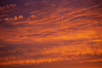 Low angle view of cloudy sky during sunset