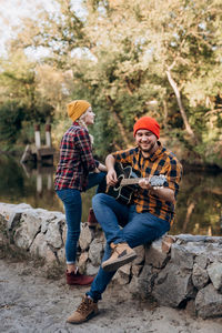 Men sitting on rock