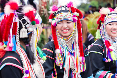 Portrait of smiling woman in traditional clothing