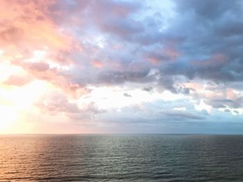 Scenic view of sea against sky at sunset