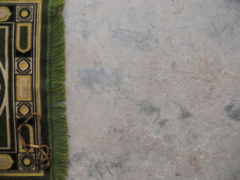 High angle view of old books on floor