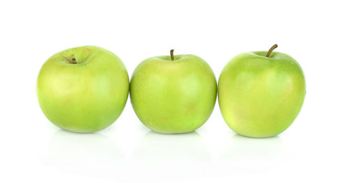 Close-up of apples on white background