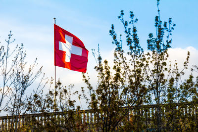 Low angle view of flag against sky