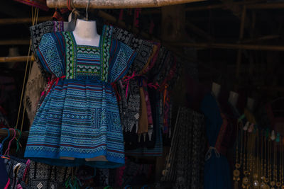 Clothes hanging in store for sale in market