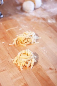 High angle view of chopped bread on cutting board