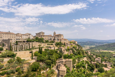 Town in gordes against sky