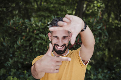 Portrait of smiling man wearing hat