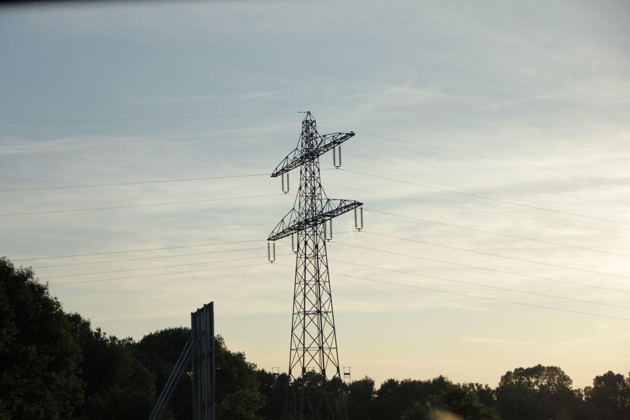 electricity pylon, fuel and power generation, power supply, power line, electricity, technology, connection, low angle view, sky, cable, tree, silhouette, built structure, cloud - sky, outdoors, nature, no people, architecture, power cable, electricity tower