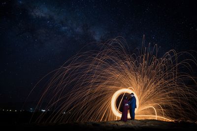 Full length of man standing at night