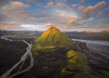 Panoramic view of volcanic landscape against sky during sunset