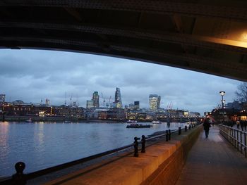 City lit up at waterfront