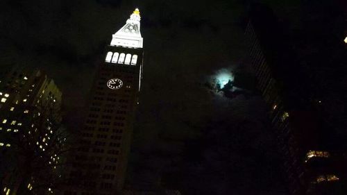 Low angle view of illuminated building at night