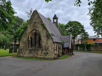 Exterior of historic building against sky