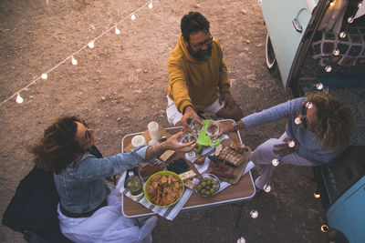 High angle view of people having food