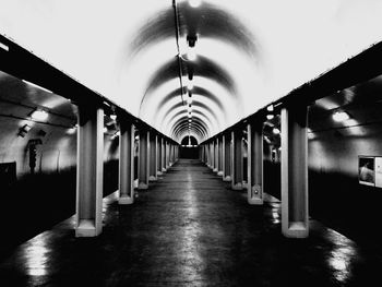 Empty road leading to tunnel