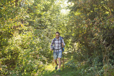 Man standing in forest