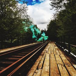 Railroad track against sky