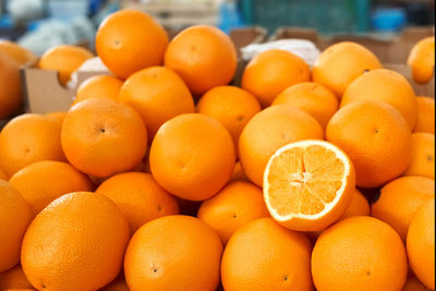 Close-up of oranges for sale at market stall