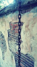 Close-up of chain against sky