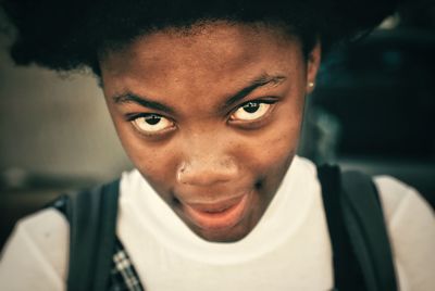 Close-up portrait of smiling young man
