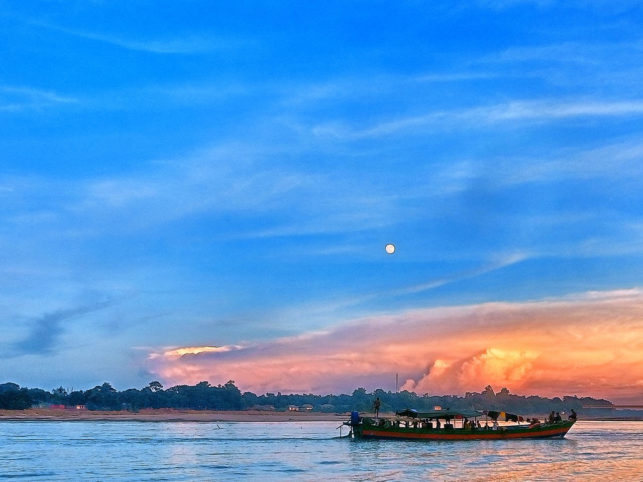 water, sky, transportation, nautical vessel, vehicle, sea, cloud, horizon, mode of transportation, nature, ocean, dusk, bay, shore, blue, travel, boat, ship, beauty in nature, scenics - nature, sunset, coast, no people, watercraft, travel destinations, evening, outdoors, tranquility, land, landscape, environment, moon, beach, sailing, architecture, tranquil scene, mountain, tourism