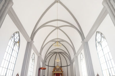 Low angle view of church ceiling