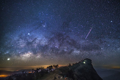 Scenic view of star field against sky at night