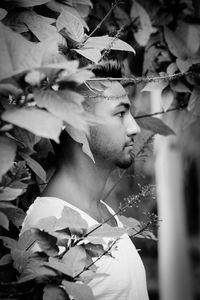 Portrait of young man looking away