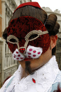 Portrait of woman wearing costume at carnival