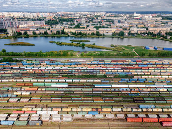 Lots of wagons tanks, platforms, dump trucks staying on railways at depot. cargo transportation