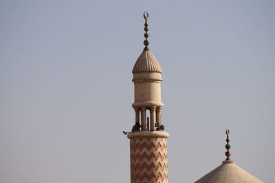 Bell tower against clear sky